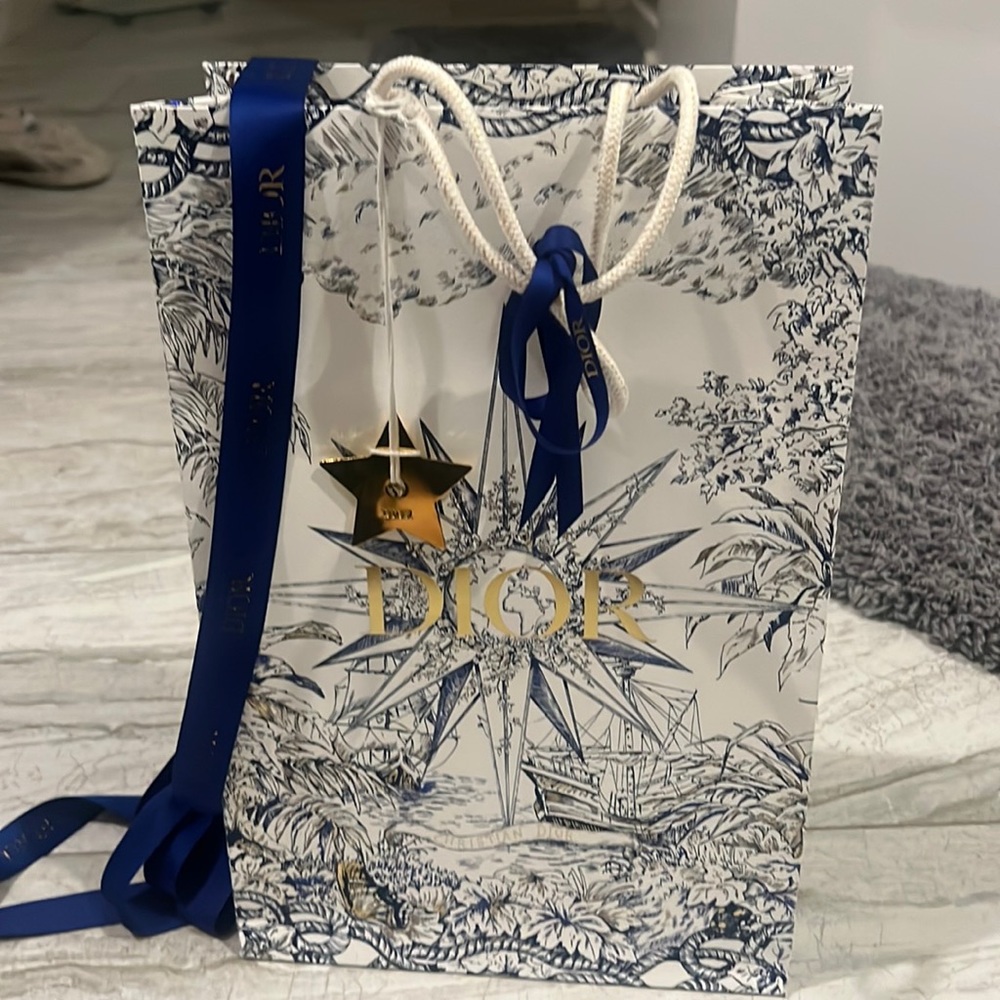 Dior bag with star wrapping though and certificate of authenticity